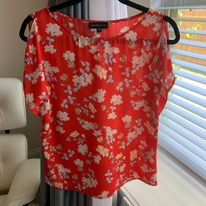 Red floral blouse
